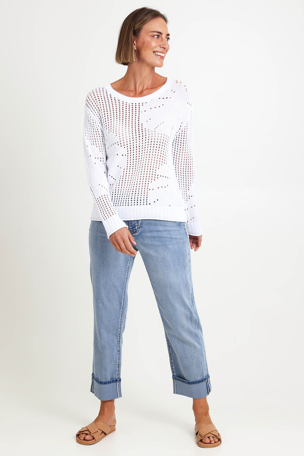 Model Riinar wearing size 10 of the Breeze Easy Sweater – White in colour White, from the front