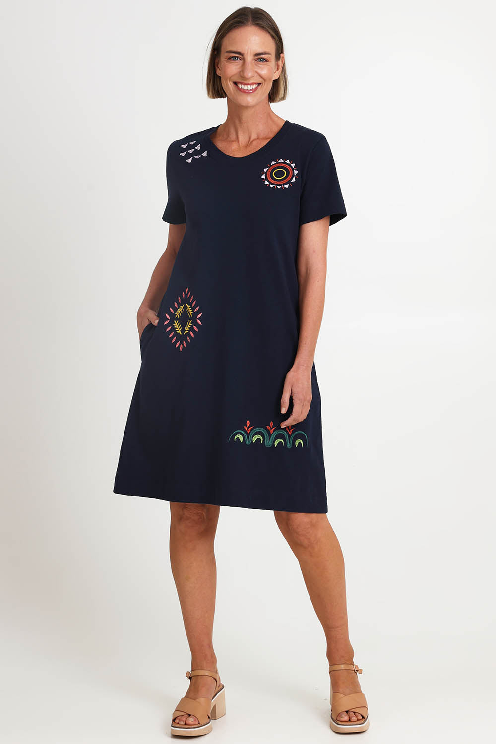 Model Riinar wearing size 10 of the Bright Spot Dress – Truenavy in colour Truenavy, from the front