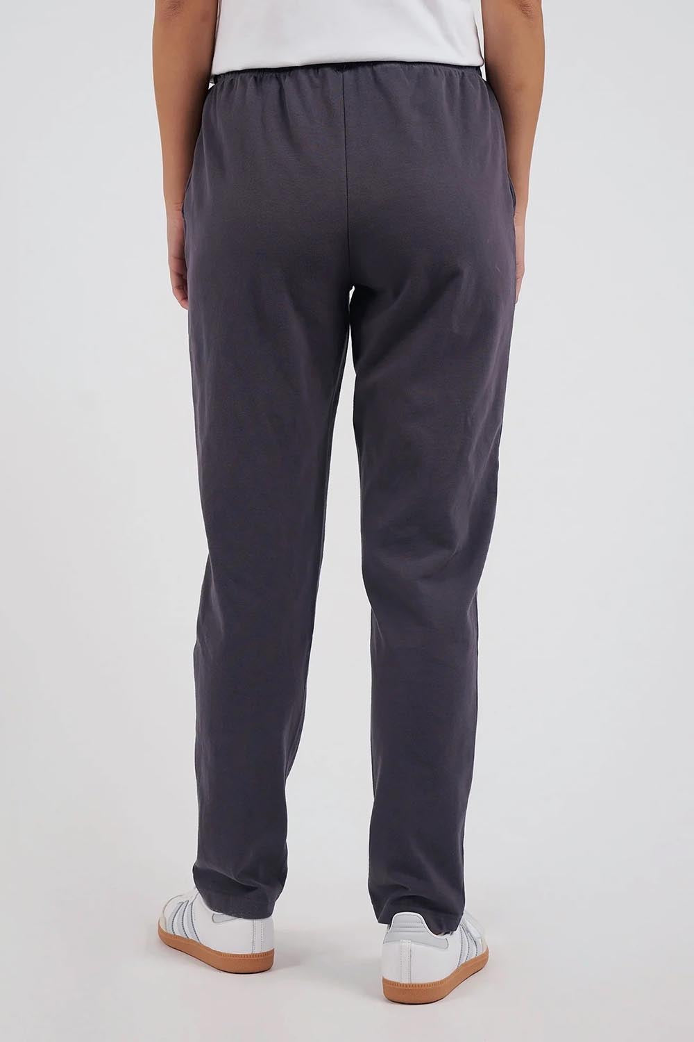 A model wearing the Elements Monday Cotton Pant in colour Coal (Grey), from the back