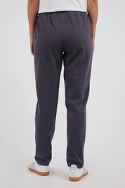 A model wearing the Elements Monday Cotton Pant in colour Coal (Grey), from the back