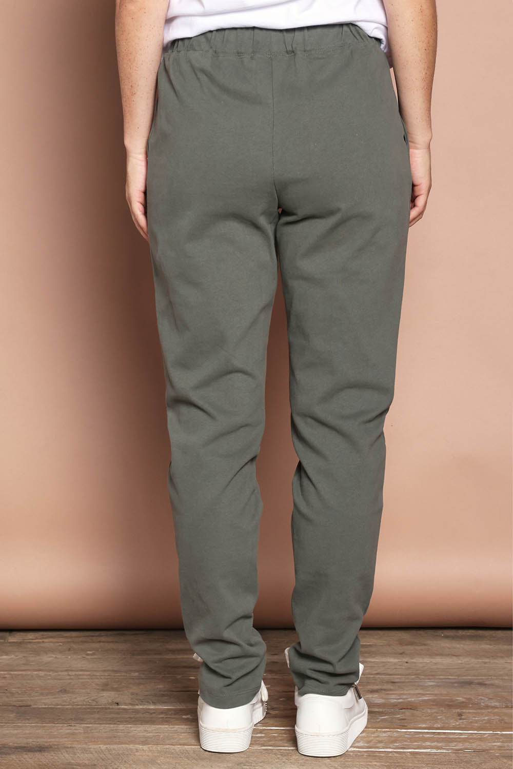Model Katie wearing size 8 of the Elements Monday Cotton Pant in colour Khaki (Green), from the back