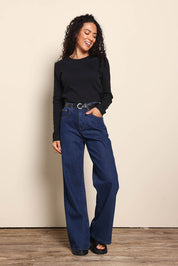 Model Pamelar wearing size 10 of the Elements Scoop Rib Cotton Blend  Long Sleeve - Black in colour Black, from the front