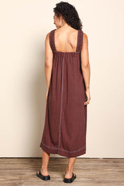 Model Pamelar wearing size 10 of the Sage Dress – Chocolate in colour Chocolate, from the front