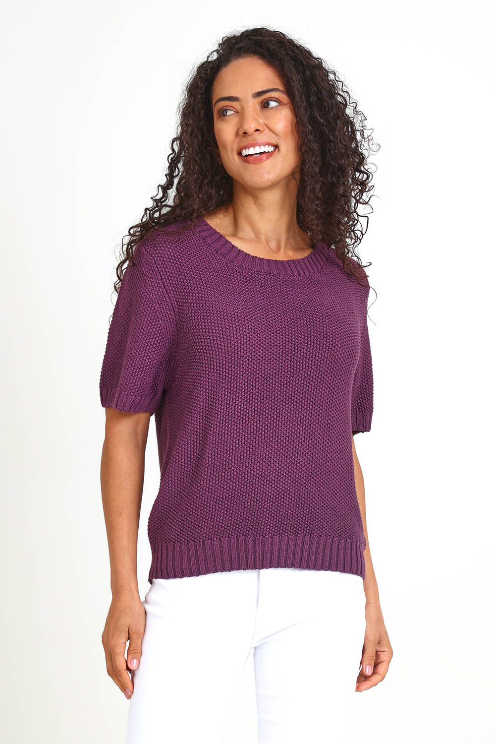 Model Pamelar wearing size 10 of the Blair Short Sleeve Knit – Plum in colour Plum, in a cropped view