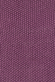Product shot of the Blair Short Sleeve Knit – Plum in colour Plum, showing detail