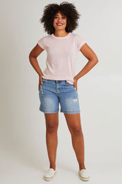 Model Olivia wearing size 10 of the Alma Metallic Knit in colour Barepink (Pink), from the front, showing the whole outfit