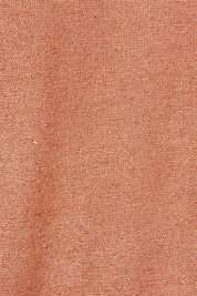 Product shot of the Alma Metallic Knit in colour Clay, detail