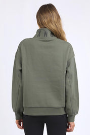 A model wearing the Elements College Zip Crew in colour Khaki (Green), from the back