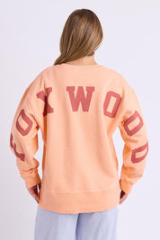 Model Genericm wearing size sample of the Elements Interval Cotton Crew – Neonpeach in colour Neonpeach, from the back