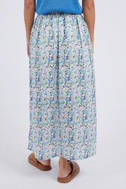 A model wearing the Rosette Floral Skirt in colour Rosette (Blue), from the back