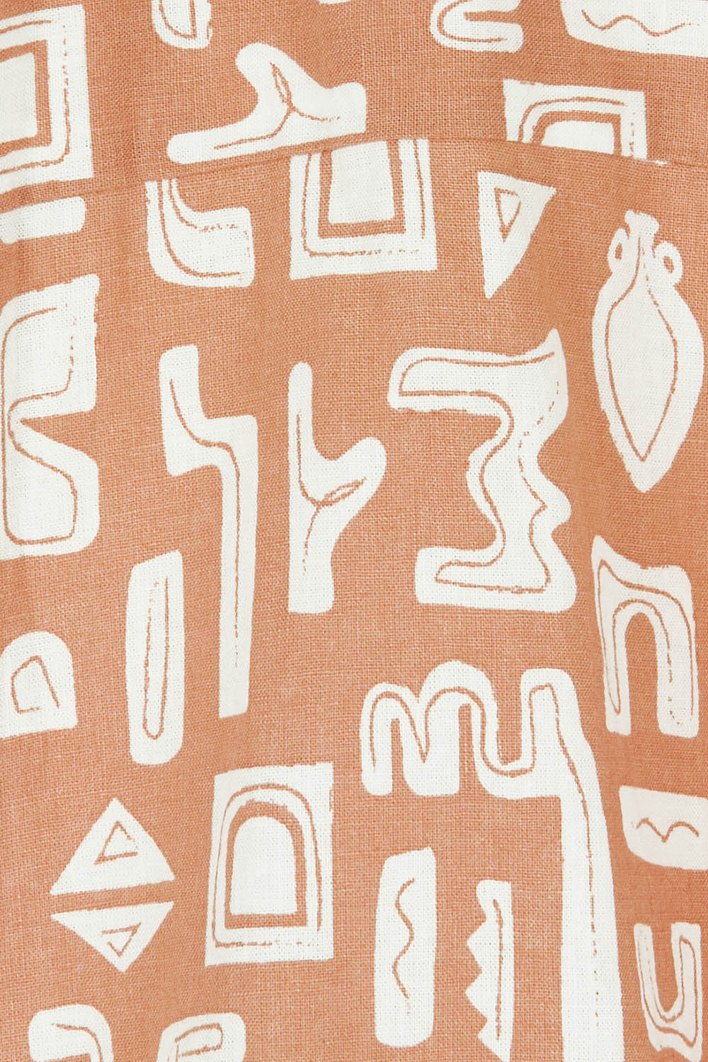 Product shot of the Etched Geo Shirt in colour Clay, detail