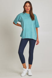 Model Madeline wearing size 10 of the Leisure Captain Cotton Tee in colour Sky (Blue), from the front, showing the whole outfit