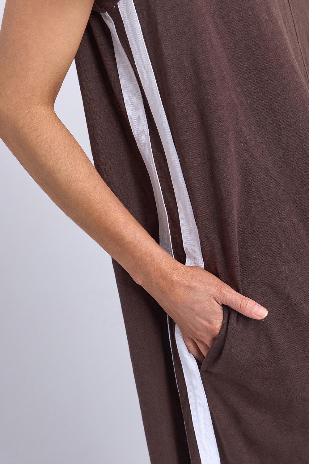A model wearing the Leisure Recovery Cotton Dress in colour Chocolate, from the front, cropped image