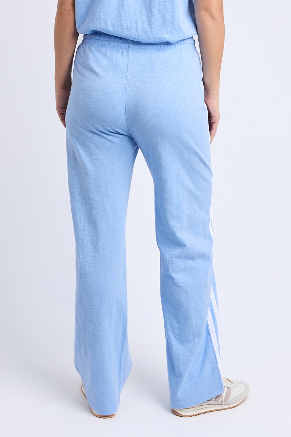 A model wearing the Leisure Power Cotton Pant in colour Blue (Blue), from the back