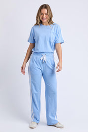 A model wearing the Leisure Power Cotton Pant in colour Blue (Blue), from the front, showing the whole outfit