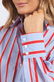 A model wearing the Leisure Stripe Cotton Blend Shirt in colour Bluered (Blue), from the front, cropped image
