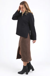 A model wearing the Jude Wool Blend Knit in colour Black (Black), from the front, showing the whole outfit