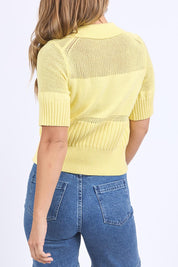 A model wearing the Trevi Cotton Knit Top in colour Lemon, from the back