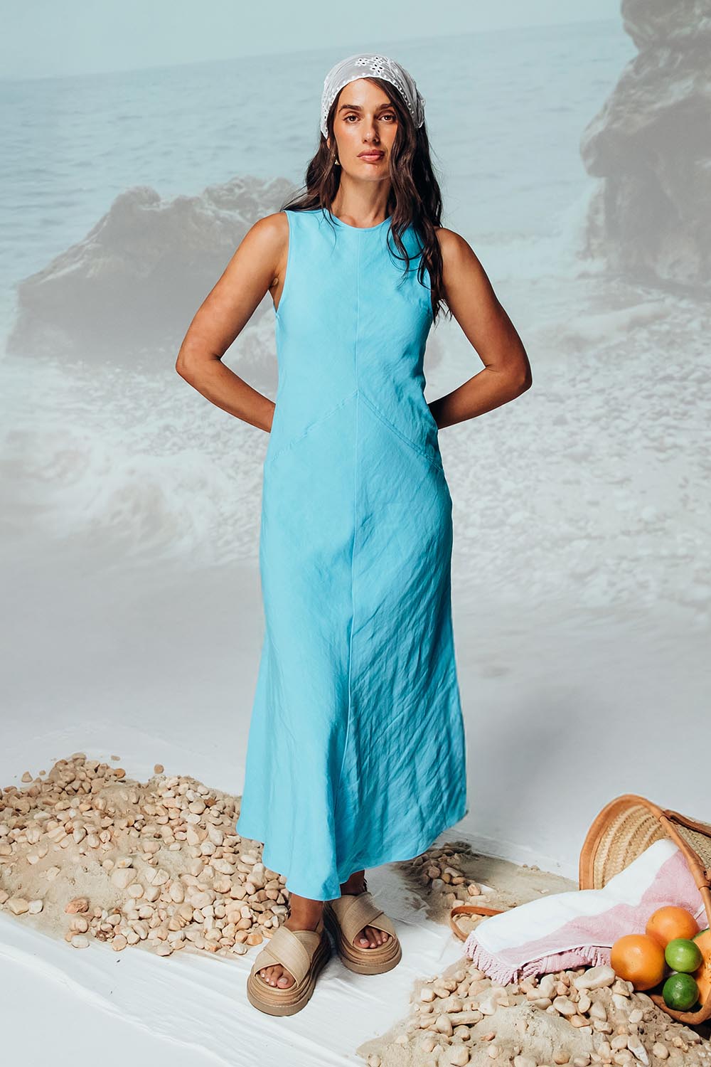 A model wearing the Azure Linen Blend Dress in colour Azureblue (Blue), from the front, showing the whole outfit