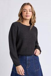 A model wearing the Blair Ls Knit in colour Black (Black), from the front, cropped image
