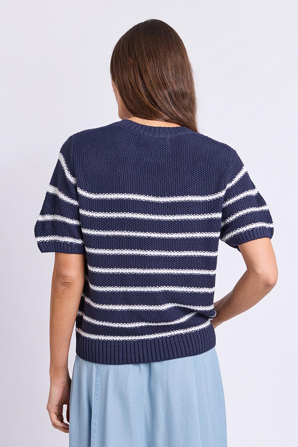Model Genericm wearing size sample of the Blair Stripe Short Sleeve Knit – Whitestrip in colour Whitestrip, from the back
