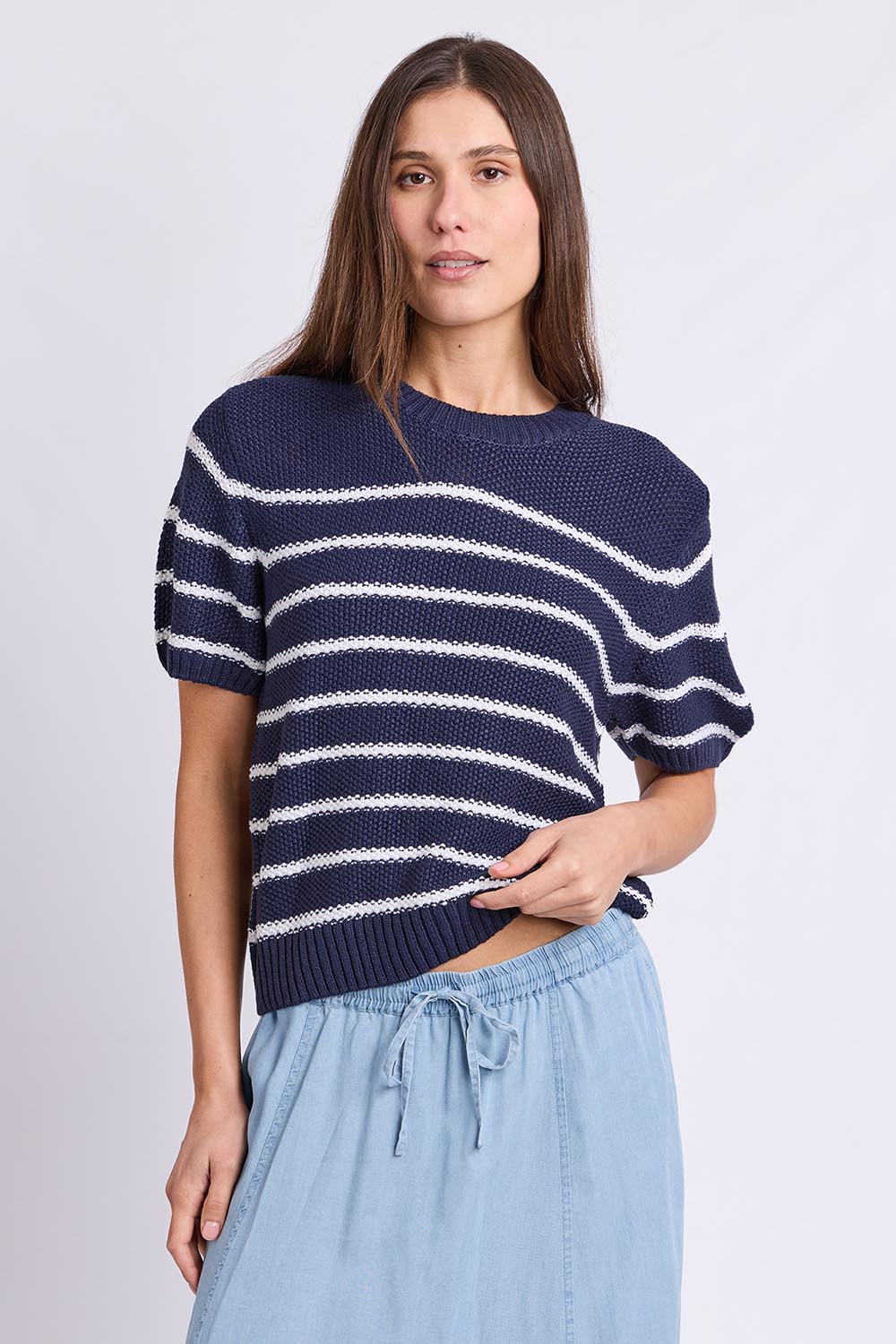 Model Genericm wearing size sample of the Blair Stripe Short Sleeve Knit – Whitestrip in colour Whitestrip, in a cropped view