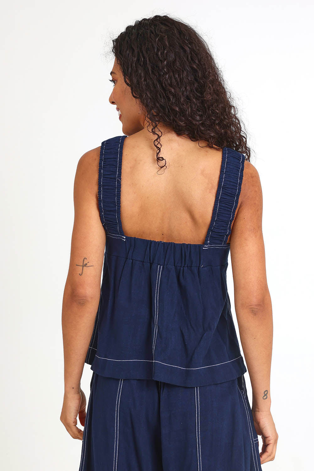 Model Pamelar wearing size 10 of the Sage Top – Dsapphire in colour Dsapphire, from the back