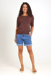 Model Pamelar wearing size 10 of the Sable Knit Top – Chocolate in colour Chocolate, from the front