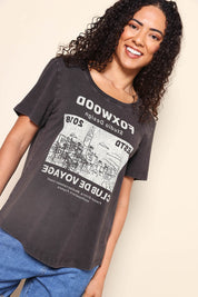 Model Pamelar wearing size 10 of the Voyage Tee – Wshedblack in colour Wshedblack, in a cropped view