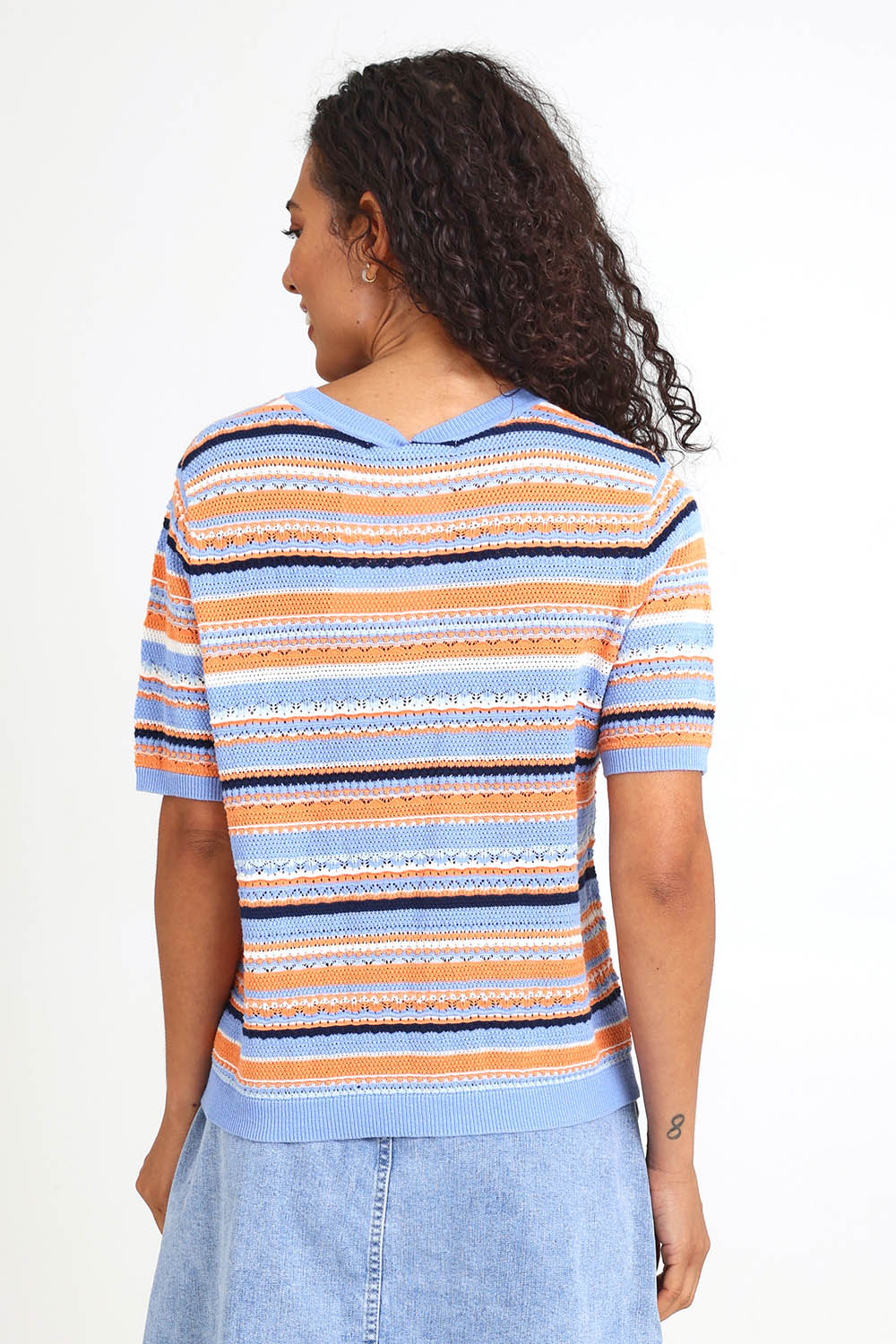 Model Pamelar wearing size 10 of the Bronte Stripe Top – Deepblue in colour Deepblue, from an angle