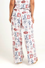 Model Pamelar wearing size 10 of the French Riviera Pant – Frenchprint in colour Frenchprint, from the back
