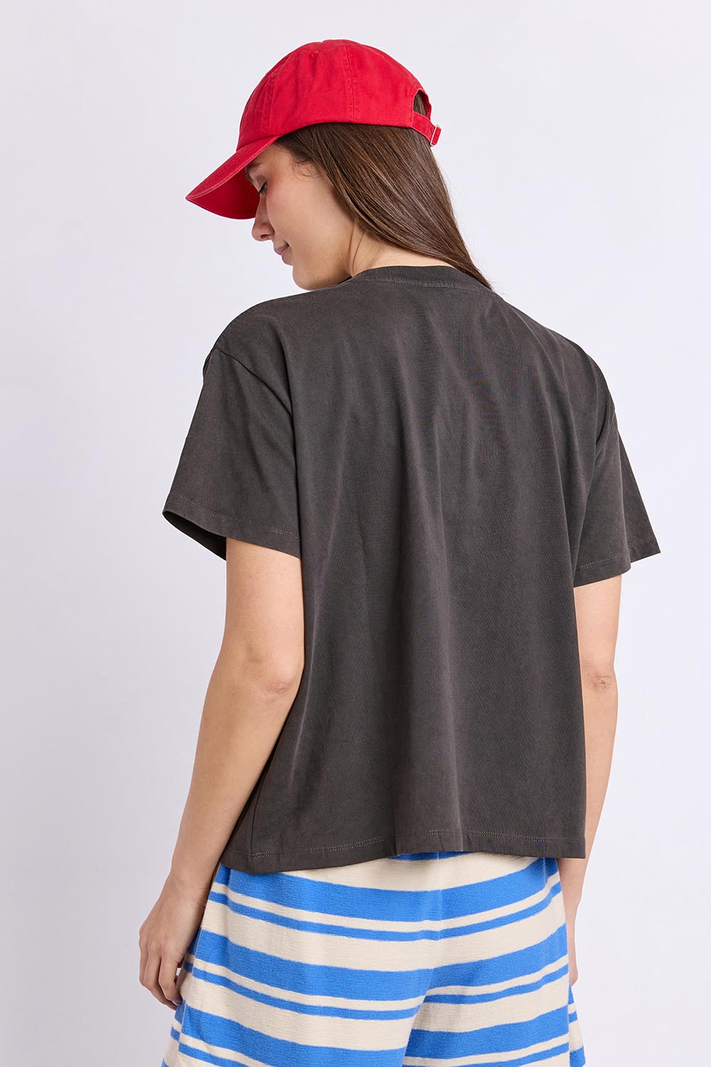 Model Genericm wearing size sample of the Cherry Tee – Wshedblack in colour Wshedblack, from the back
