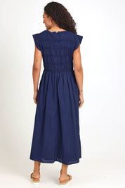 Model Pamelar wearing size 10 of the Memphis Dress – Deepblue in colour Deepblue, from the front