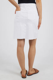 A model wearing the Elements Belle Skirt in colour Cloud (White), from the back
