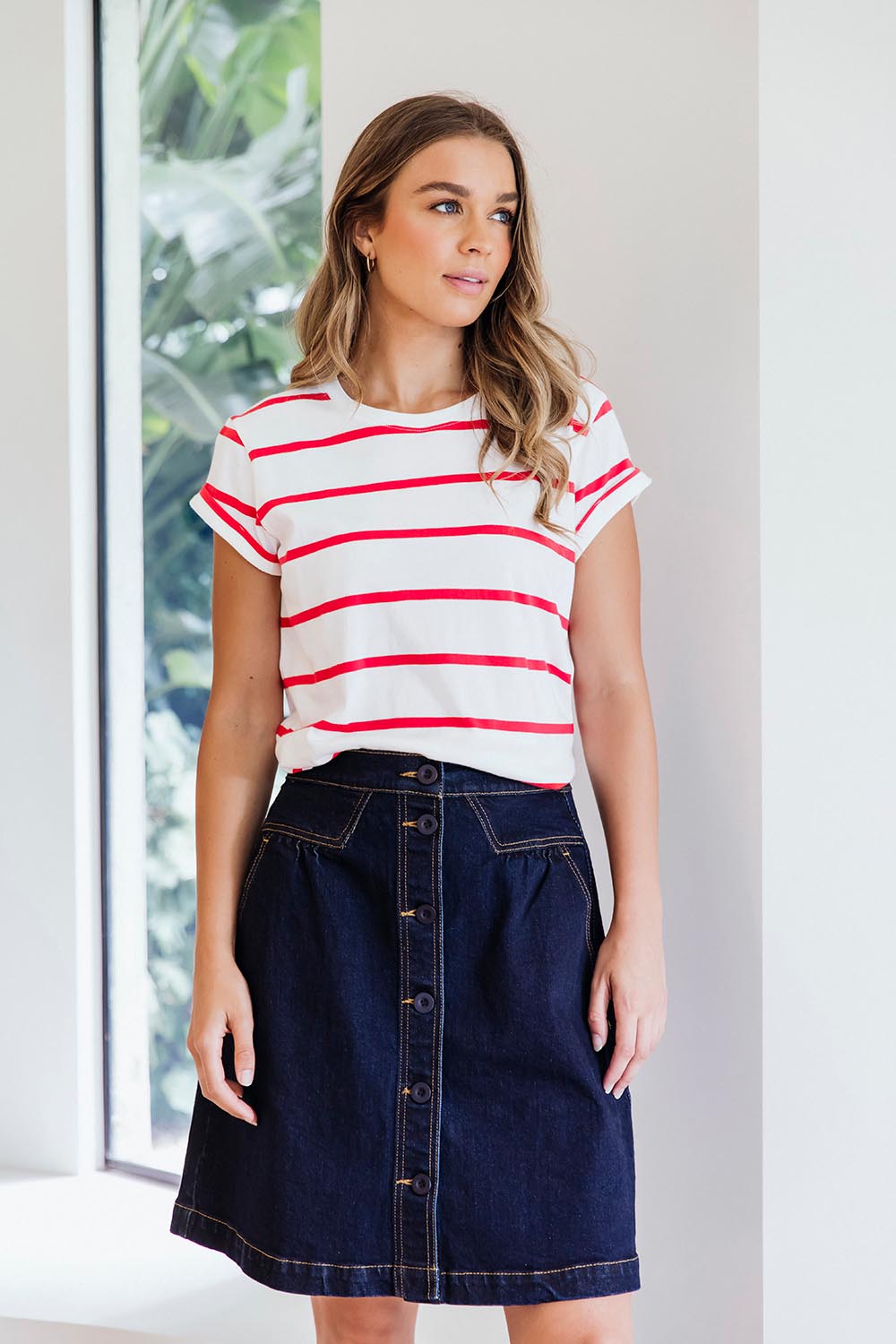 A model wearing the Elements Amanda Skirt in colour Indigoden (Blue), from the front, showing the whole outfit