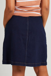 Model Olivia wearing size 10 of the Elements Amanda Skirt in colour Indigoden (Blue), from the back