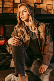 A model wearing the Daisy Denim Overshirt in colour Chocolate, from the front, showing the whole outfit