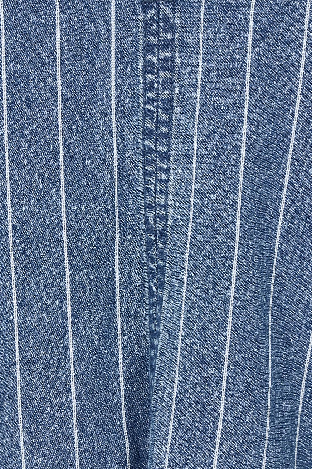 Product shot of the Tivoli Denim Top in colour Midblue (Blue), detail