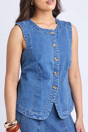 A model wearing the Abbott Denim Vest in colour Midblue (Blue), from the front, cropped image