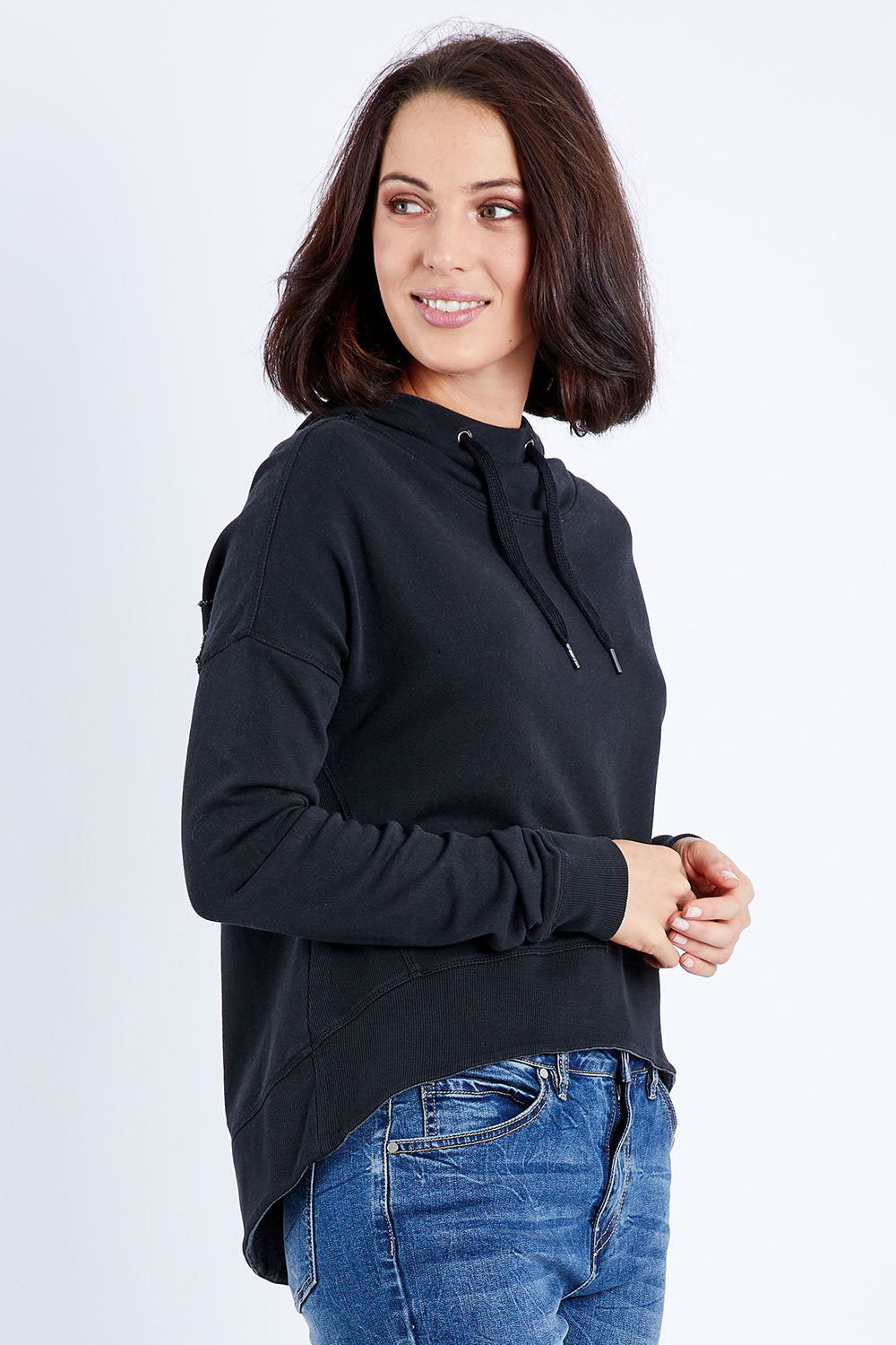 Model Andrea wearing size 10 of the Elements Jasmine Hoodie in colour Black (Black), from the front, cropped image