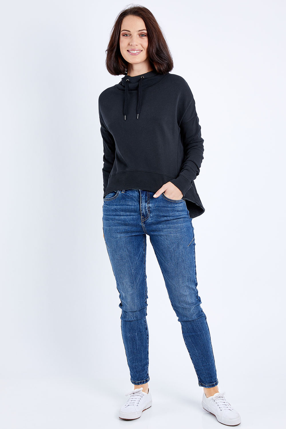Model Andrea wearing size 10 of the Elements Jasmine Hoodie in colour Black (Black), from the front, showing the whole outfit