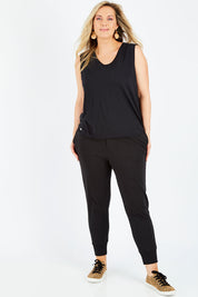 Model Jess wearing size 14 of the Chelsea Pant in colour Black (Black), from the front, showing the whole outfit