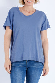 Model Veronica wearing size 10 of the Elements Night Hawk Tee in colour Blue (Blue), from the front, cropped image