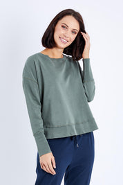 Model Andrea wearing size 10 of the Elements Delilah Crew in colour Khaki (Green), from the front, cropped image