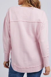 A model wearing the Elements Simplified Cotton Crew in colour Blossom (Pink), from the back