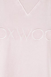 Product shot of the Elements Simplified Cotton Crew in colour Blossom (Pink), detail