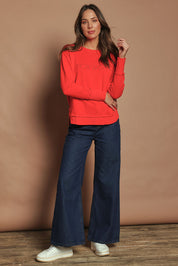 Model Madeline wearing size 10 of the Elements Simplified Cotton Crew in colour Brightred (Red), from the front, showing the whole outfit