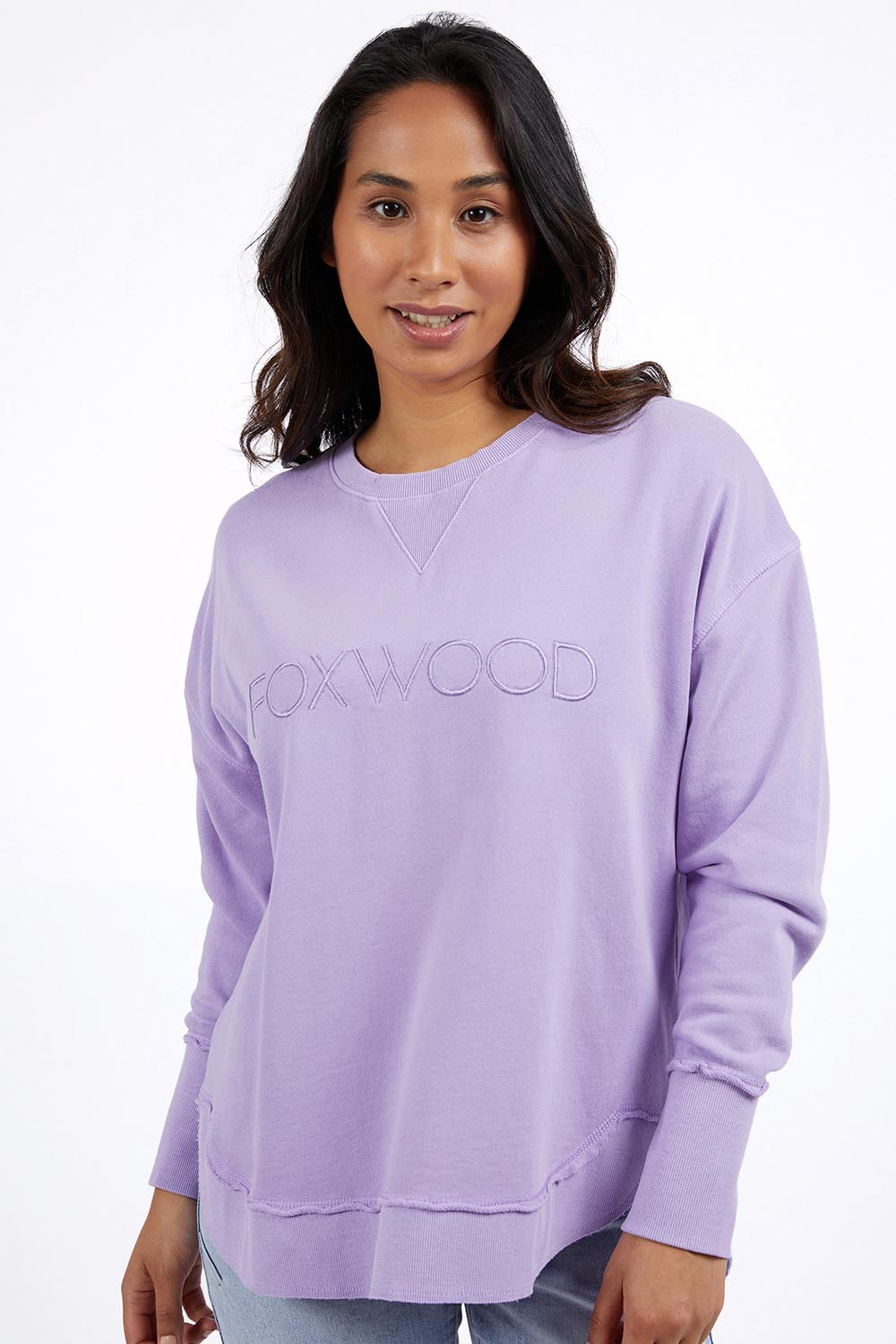 A model wearing the Elements Simplified Cotton Crew in colour Lavender (Purple), from the front, cropped image