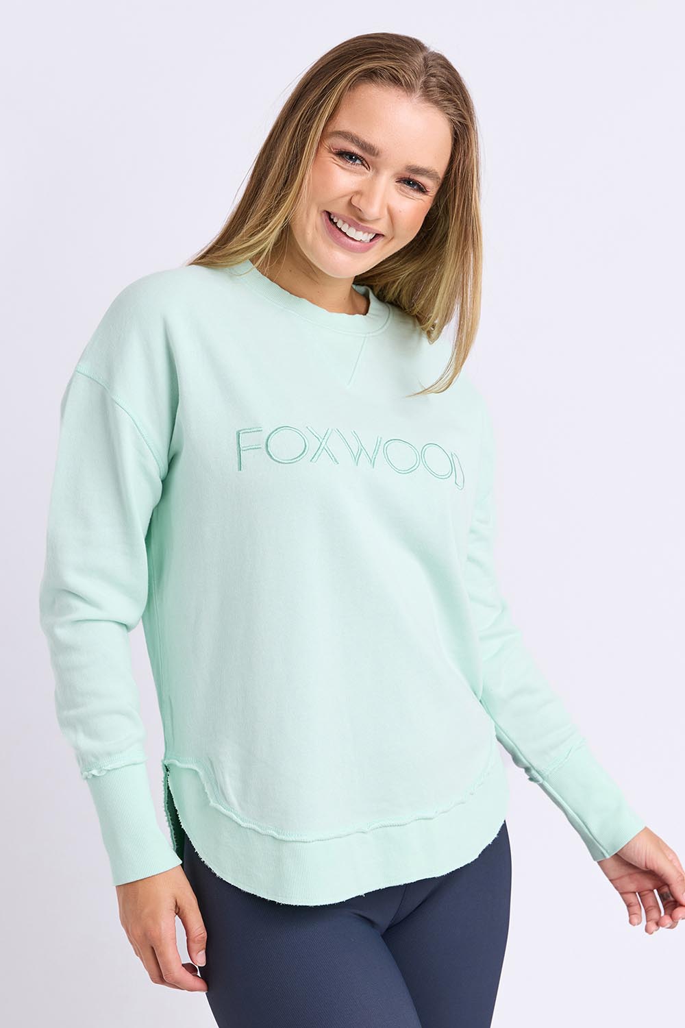 Model Genericm wearing size sample of the Elements Simplified Cotton Crew – Palemint in colour Palemint, in a cropped view