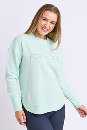 Model Genericm wearing size sample of the Elements Simplified Cotton Crew – Palemint in colour Palemint, in a cropped view